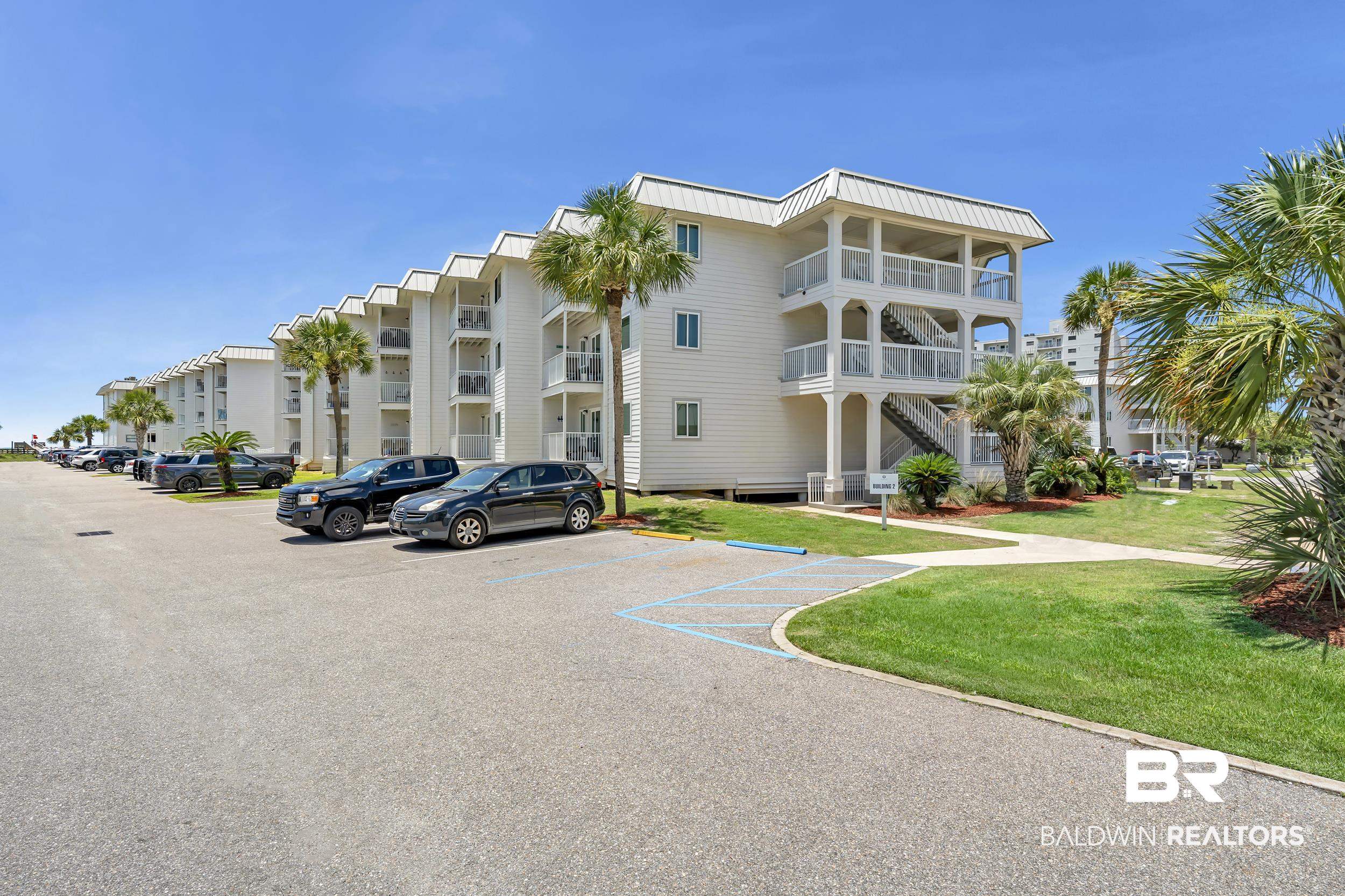 400 Plantation Road, Unit 2118 Gulf Shores, AL 36542 - Photo 43 of 59 Multi-story residential complex featuring white siding and individual balconies