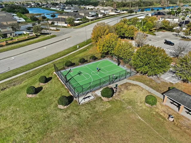 an aerial view of a house with swimming pool