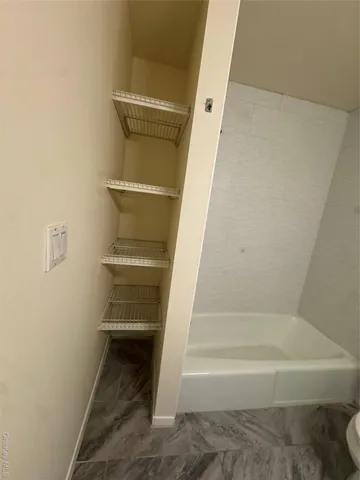 a bathroom with a bathtub