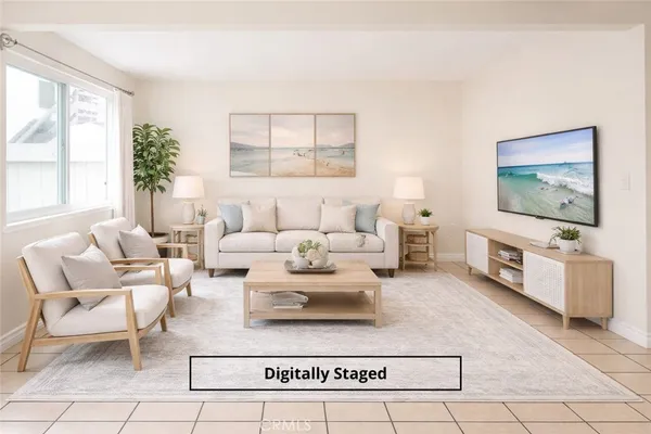 a kitchen with stainless steel appliances a stove a sink a refrigerator and cabinets