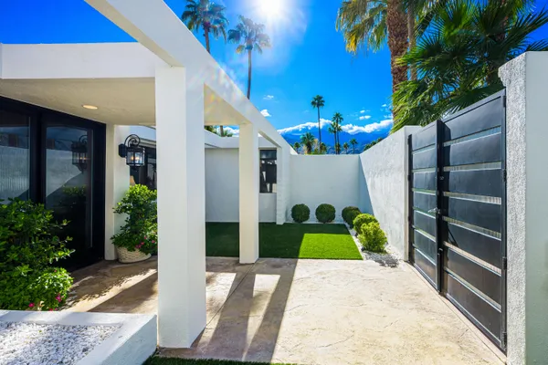 a house view with a outdoor space