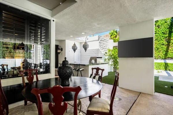 a view of a dining room with furniture