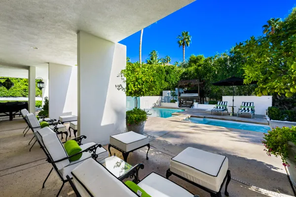 a building outdoor space with patio furniture