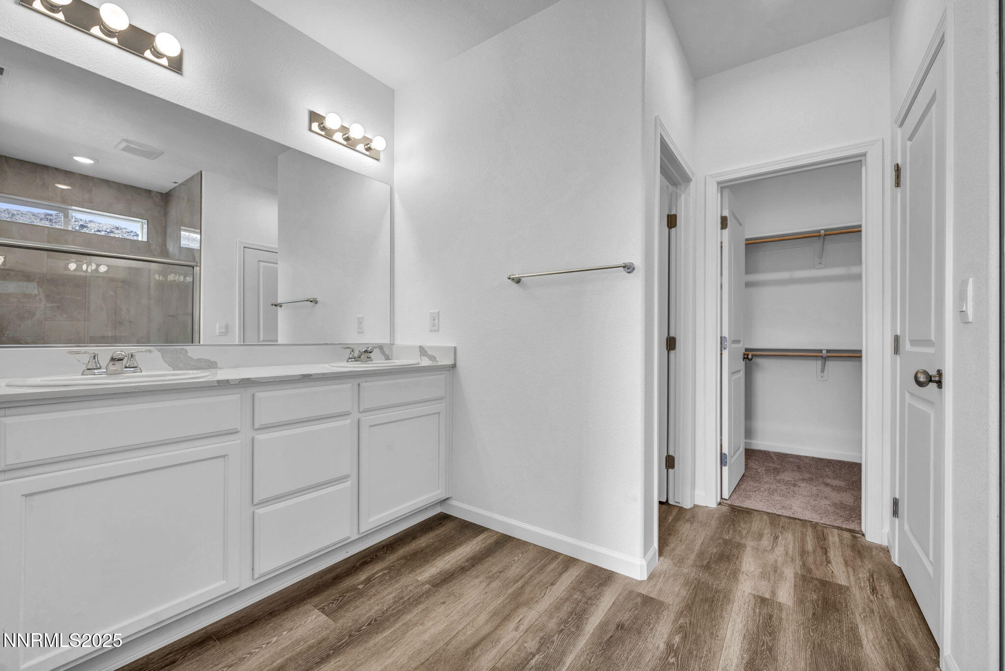 8470 Endor Drive, Unit LOT 15 Reno, NV 89506 - Photo 16 of 27 a bathroom with a sink and a mirror