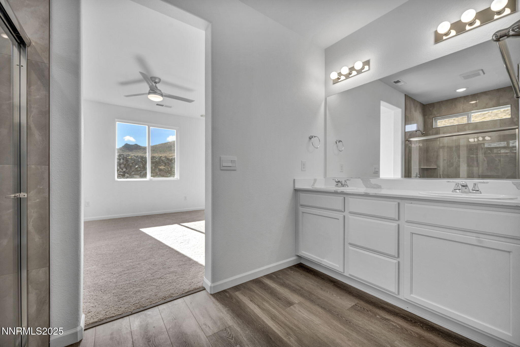 8470 Endor Drive, Unit LOT 15 Reno, NV 89506 - Photo 21 of 27 a bathroom with a sink and a mirror