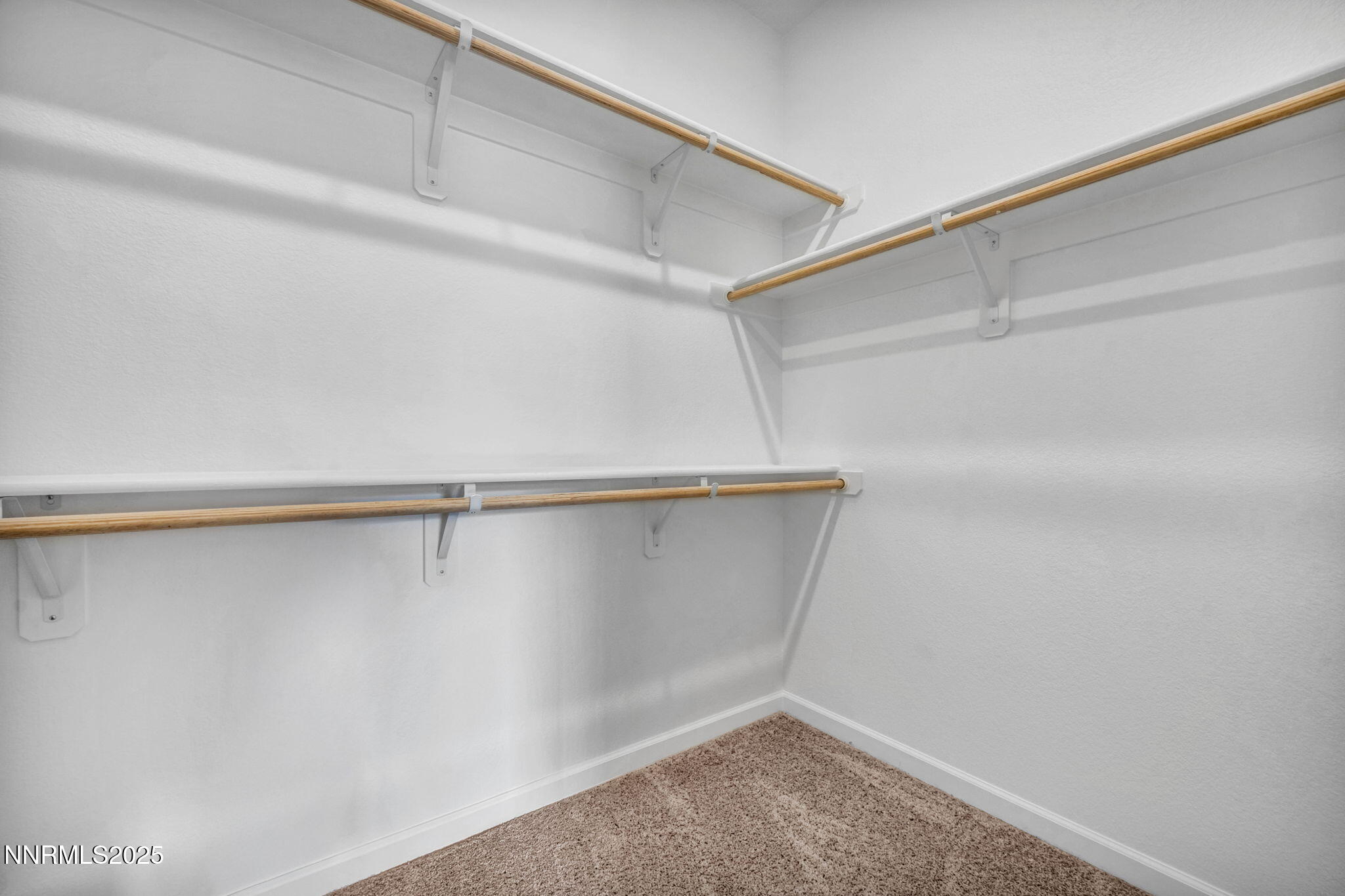 8470 Endor Drive, Unit LOT 15 Reno, NV 89506 - Photo 22 of 27 a view of an empty walk in closet