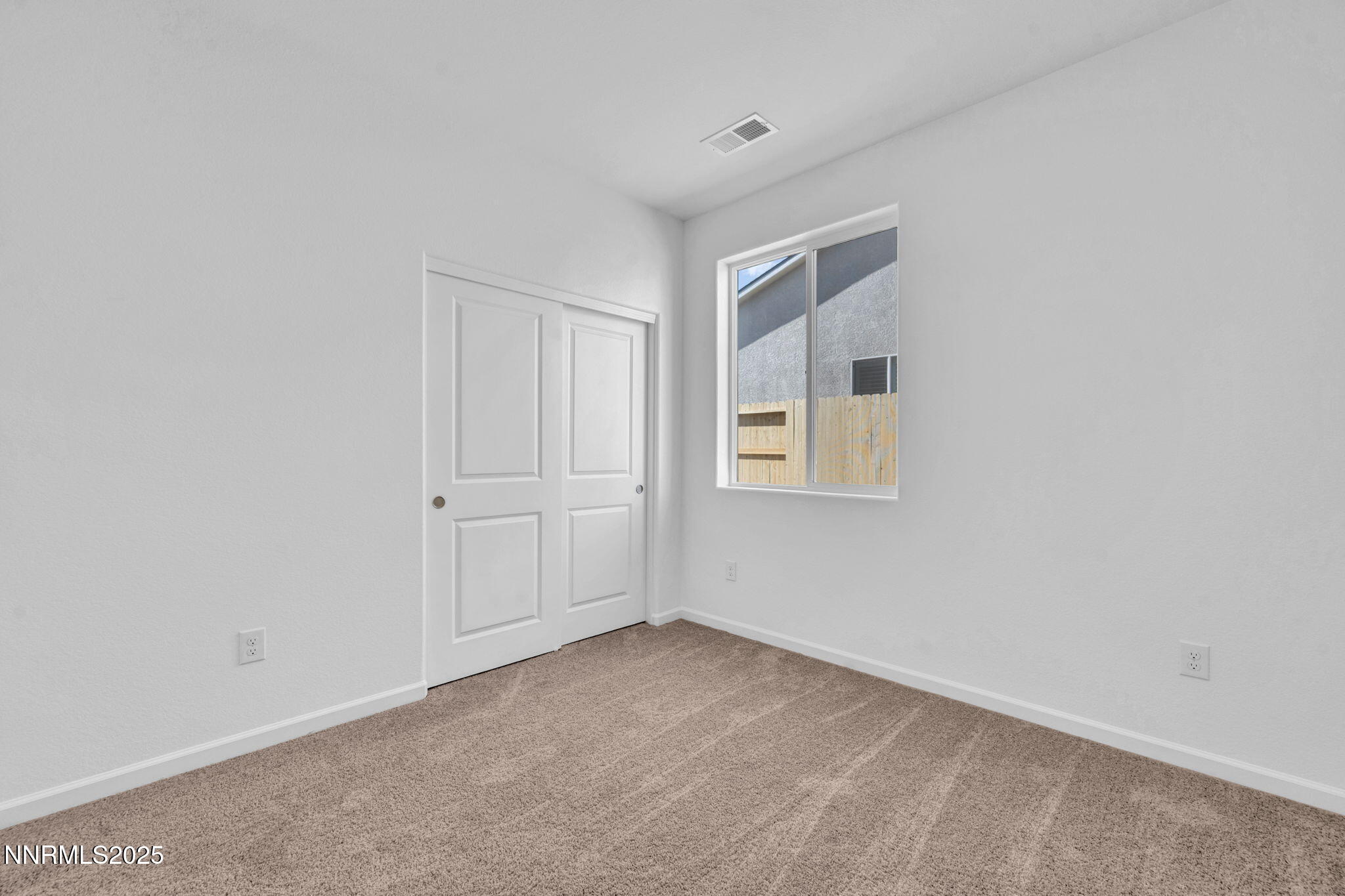 8470 Endor Drive, Unit LOT 15 Reno, NV 89506 - Photo 27 of 27 a view of an empty room with closet