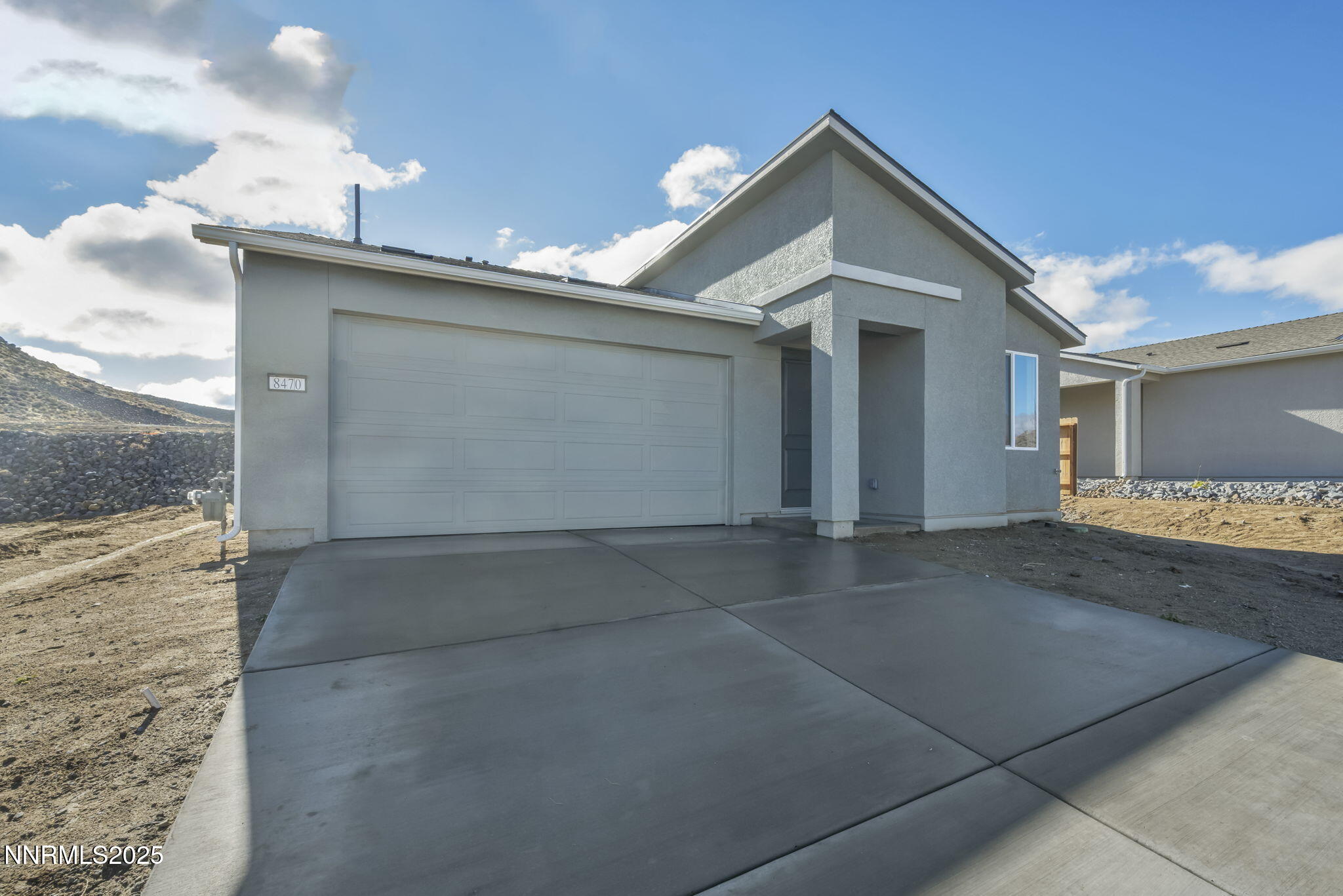 8470 Endor Drive, Unit LOT 15 Reno, NV 89506 - Photo 4 of 27 a view of a house with a yard