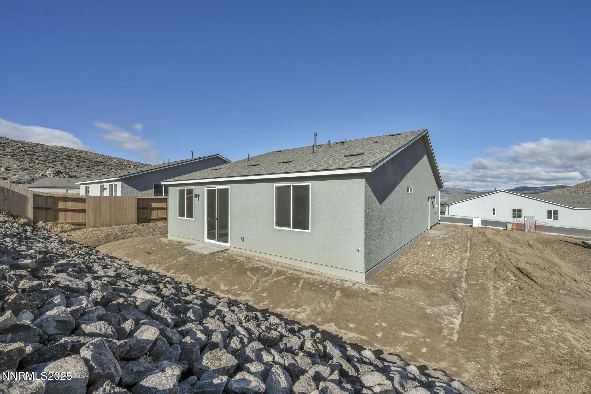 8470 Endor Drive, Unit LOT 15 Reno, NV 89506 - Photo 6 of 27 a view of a house with a backyard