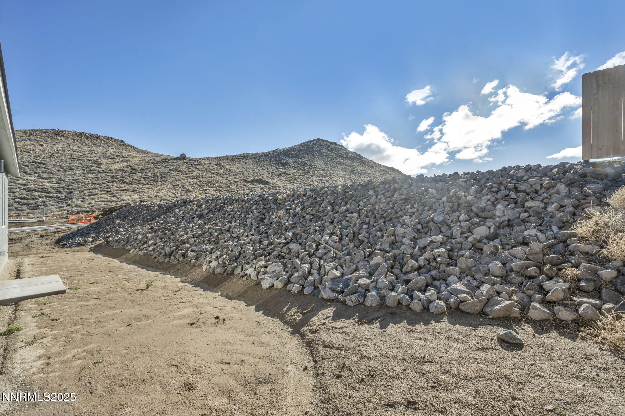 8470 Endor Drive, Unit LOT 15 Reno, NV 89506 - Photo 8 of 27 a view of a sky from a yard