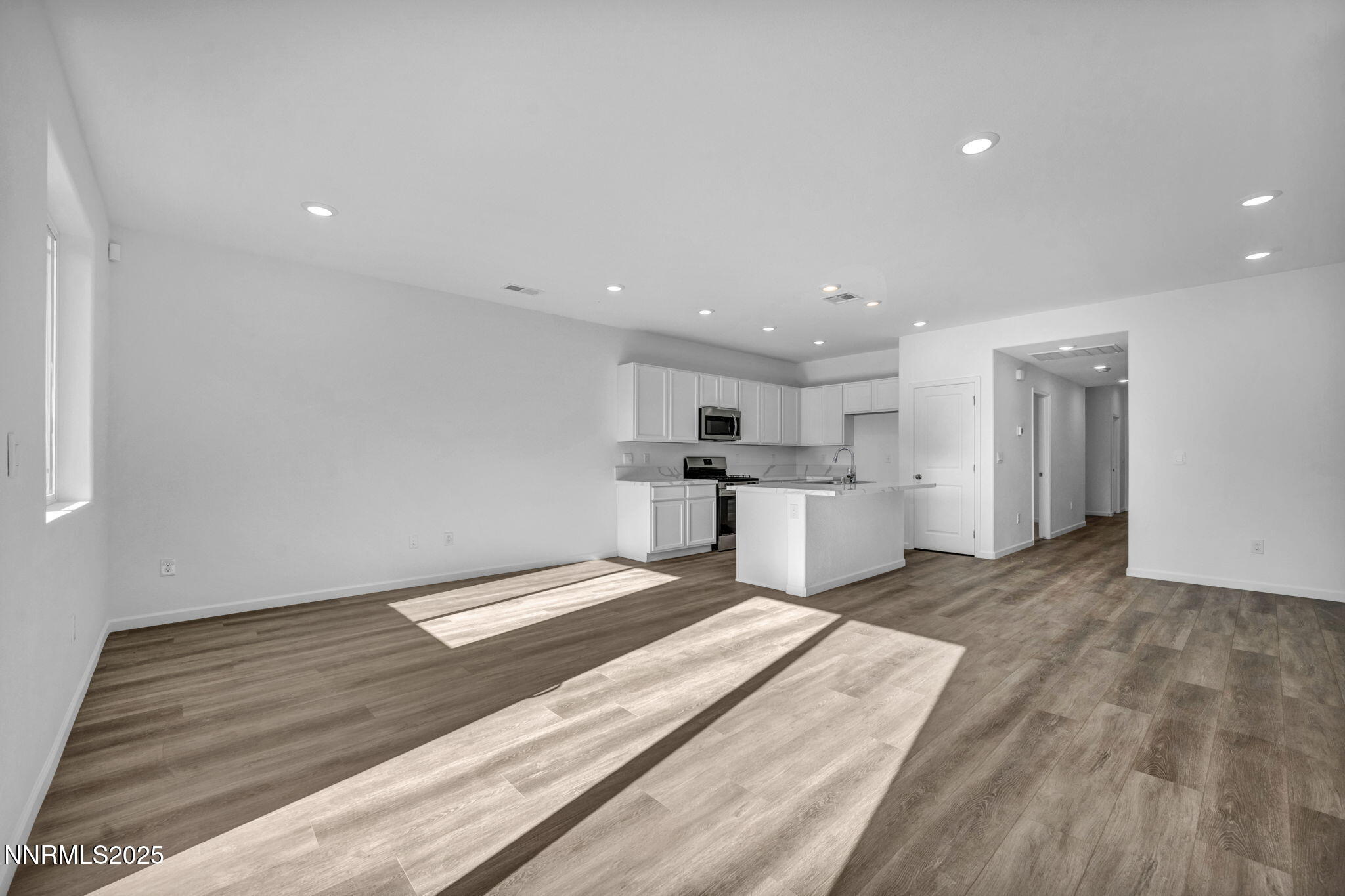 8470 Endor Drive, Unit LOT 15 Reno, NV 89506 - Photo 9 of 27 a view of a kitchen with sink and refrigerator