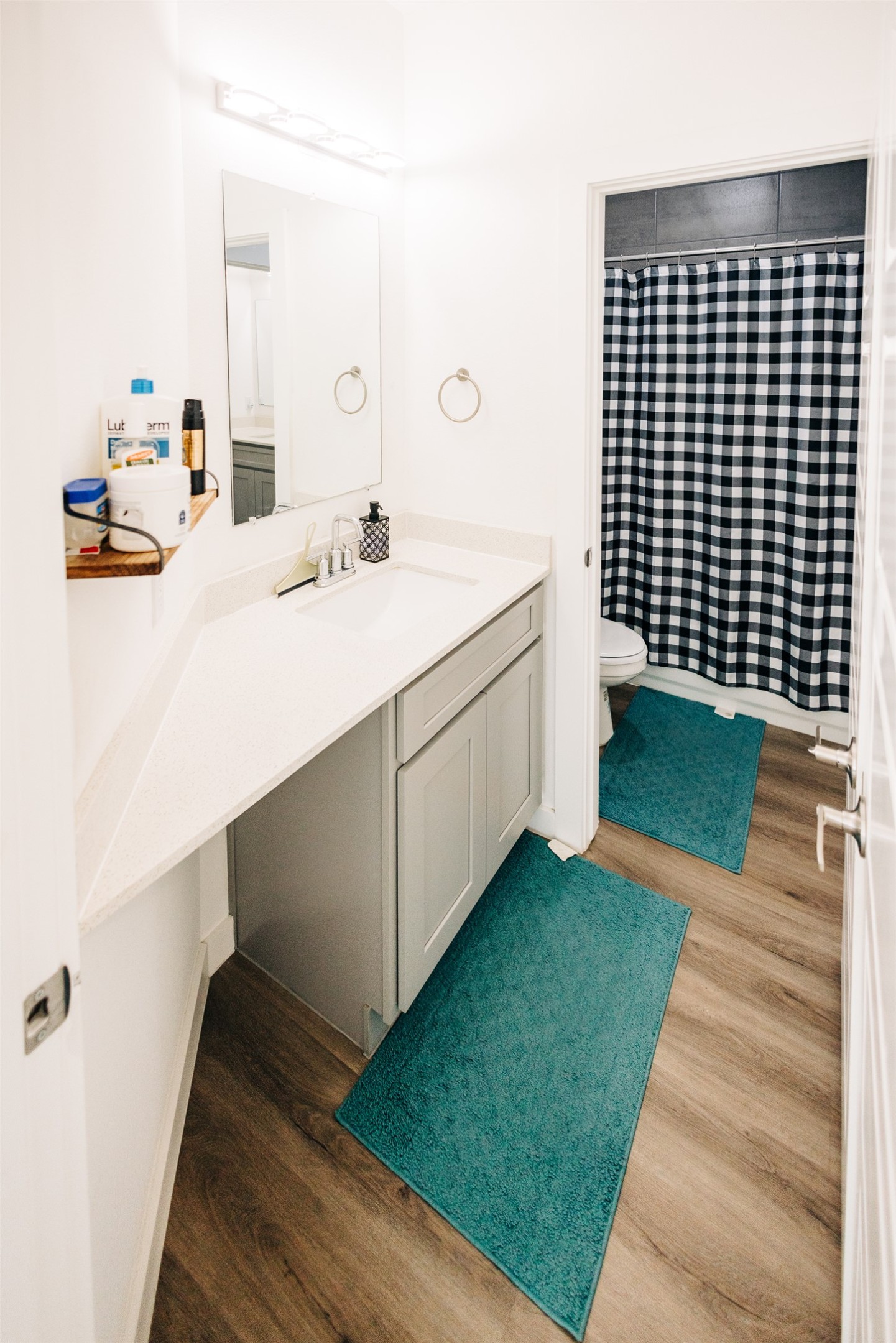 12500 Lamppost Lane, Unit 17 Austin, TX 78727 - Photo 13 of 19 a bathroom with a sink and a mirror
