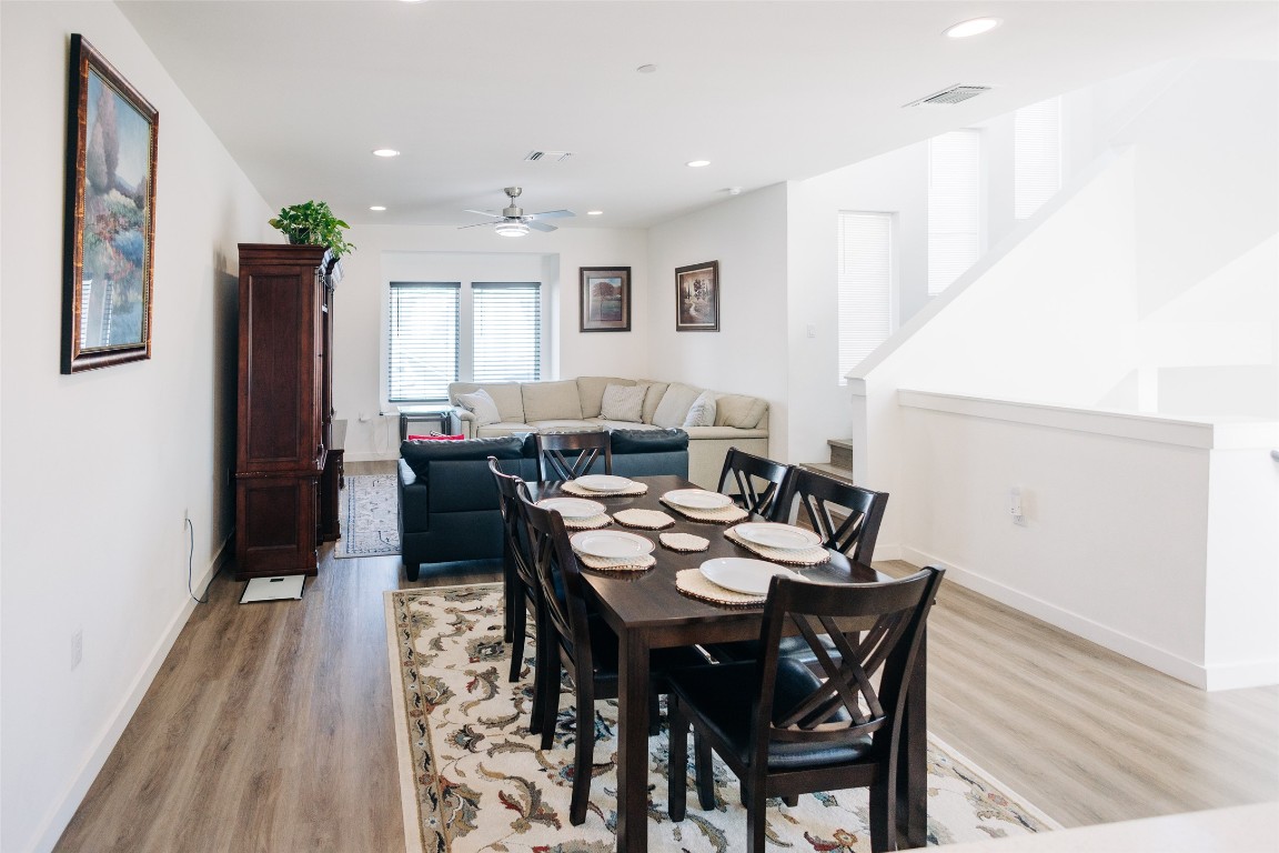 12500 Lamppost Lane, Unit 17 Austin, TX 78727 - Photo 9 of 19 a view of a dining room with furniture and wooden floor