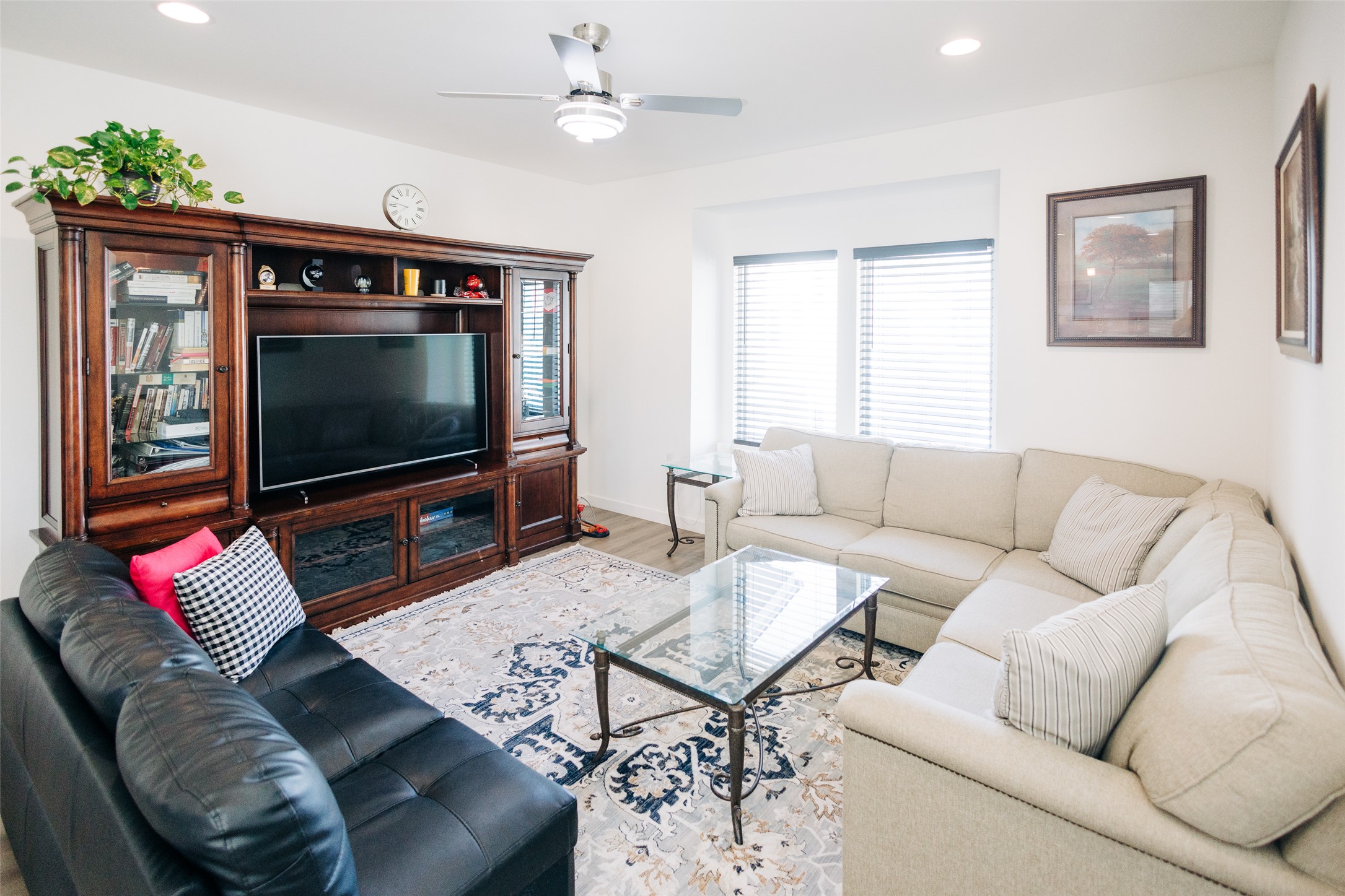 12500 Lamppost Lane, Unit 17 Austin, TX 78727 - Photo 10 of 19 a living room with furniture and a flat screen tv