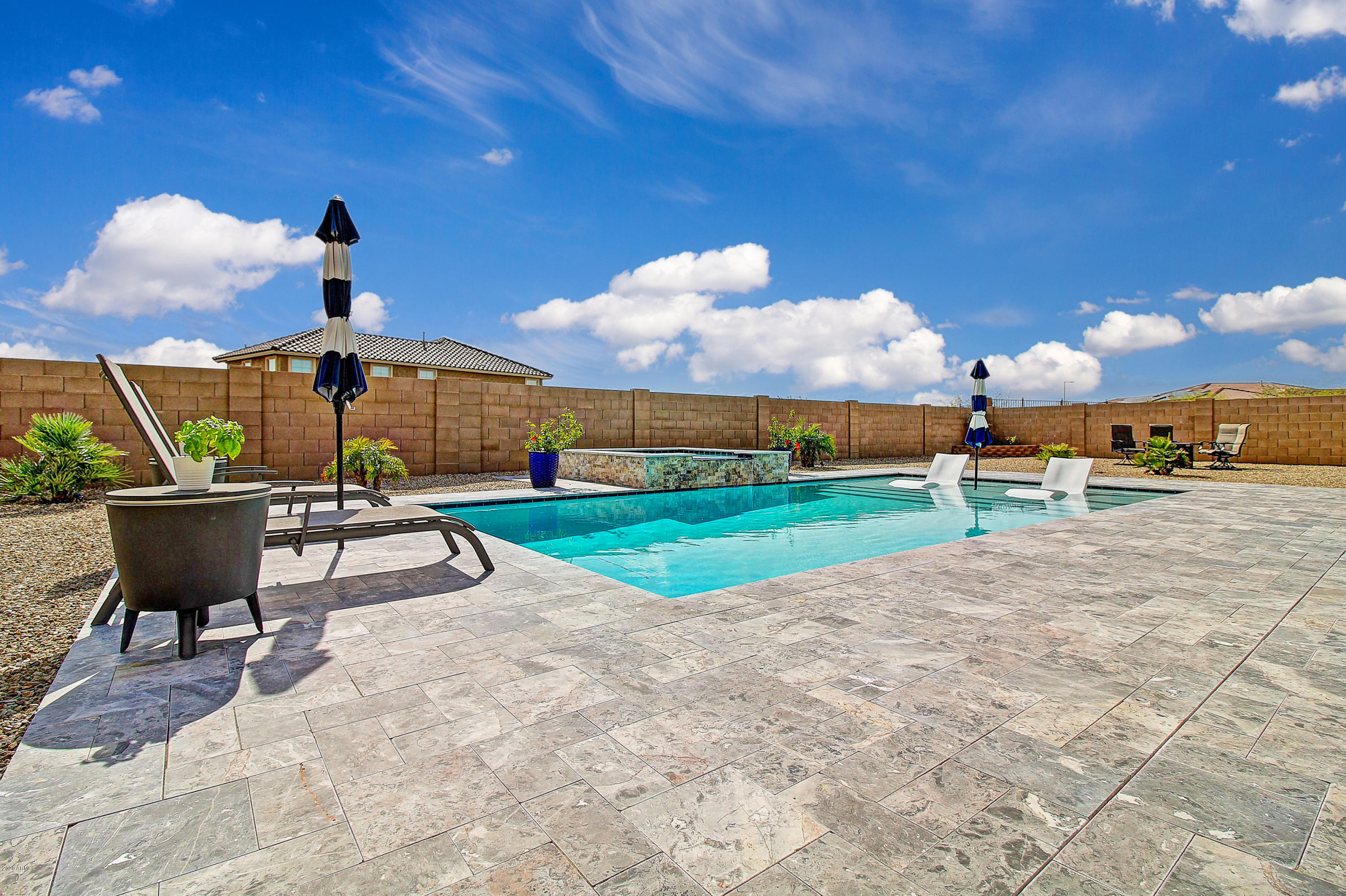 18285 West Tecoma Road Goodyear, AZ 85338 - Photo 31 of 60 Upgraded pool decking