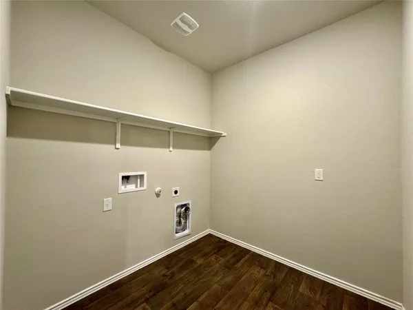 a view of small space with racks on the wall