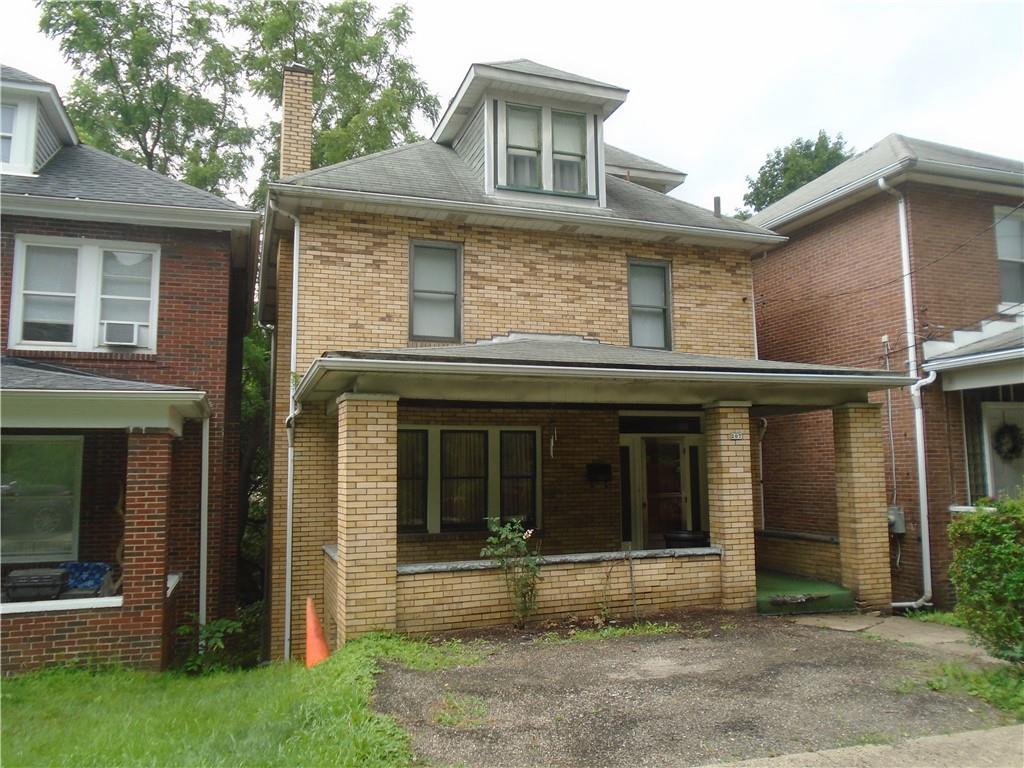 207 Locust Street Ambridge, PA 15003 - Photo 2 of 19 a front view of a house