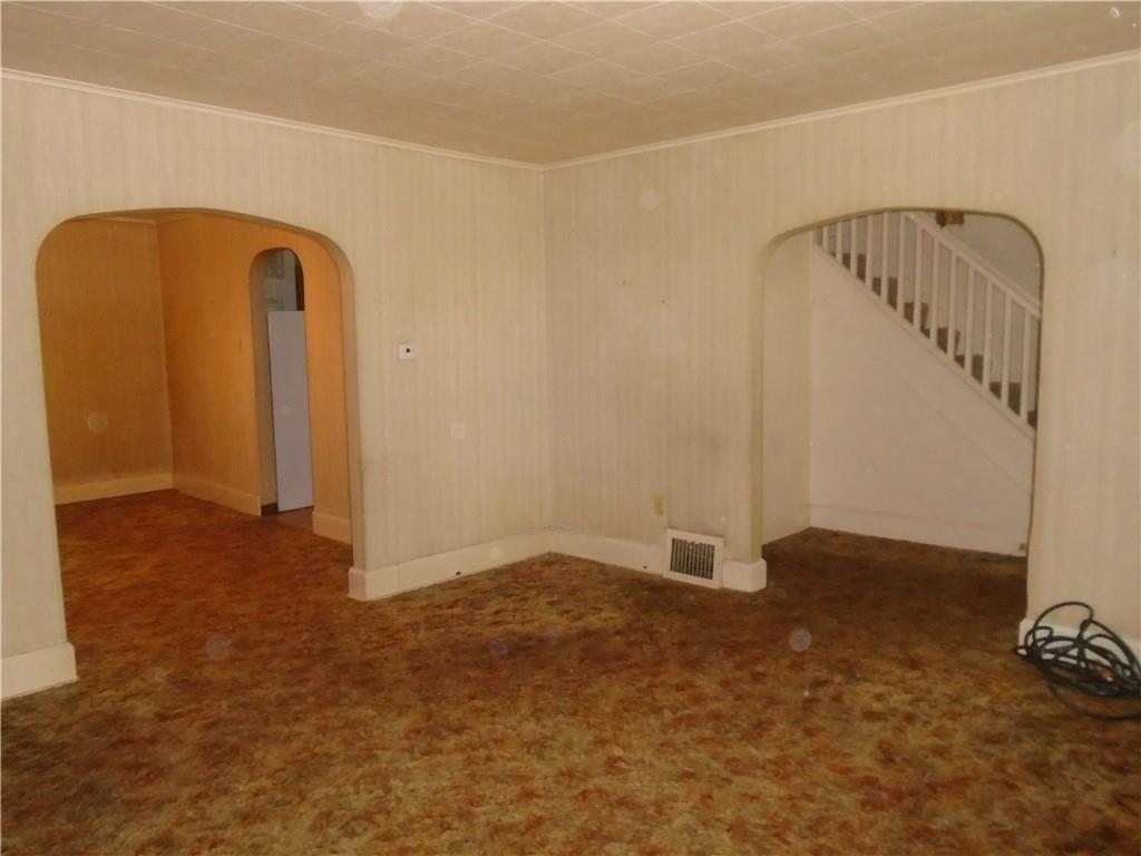 207 Locust Street Ambridge, PA 15003 - Photo 6 of 19 a view of an empty room with windows