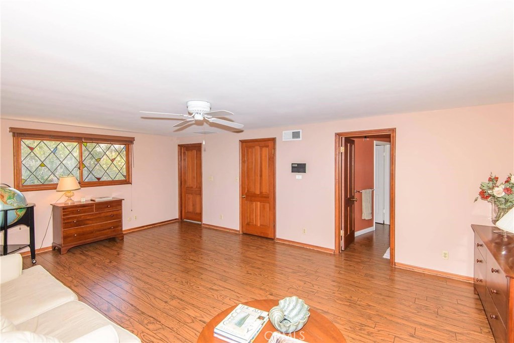 2721 Coral Ridge Road Rancho Palos Verdes, CA 90275 - Photo 14 of 24 a view of empty room with wooden floor and fan