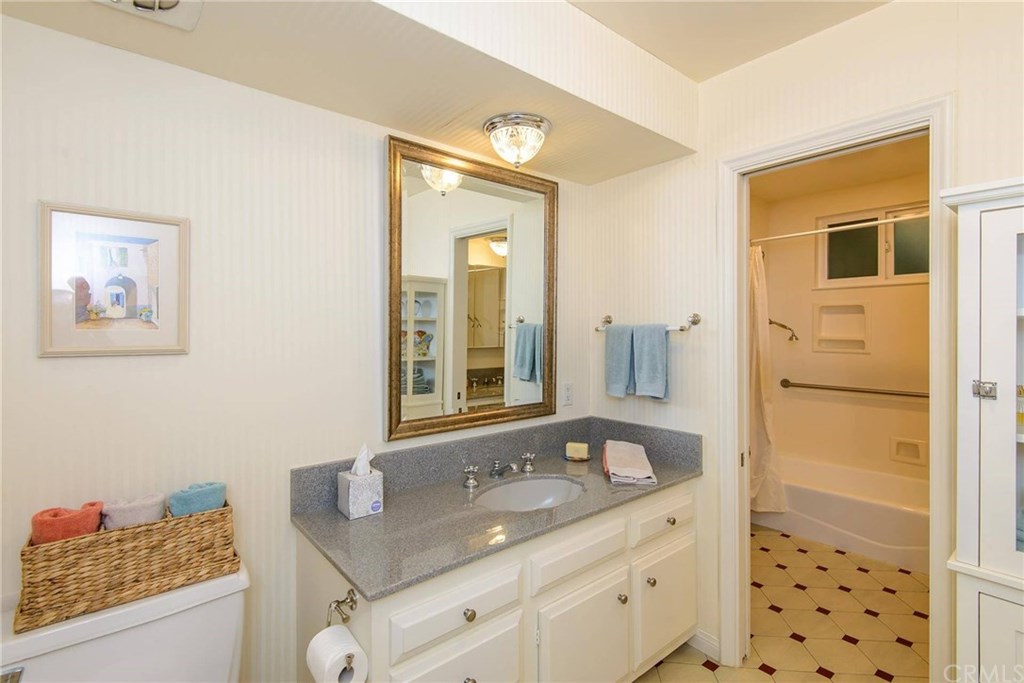 2721 Coral Ridge Road Rancho Palos Verdes, CA 90275 - Photo 15 of 24 a bathroom with a granite countertop sink mirror and double