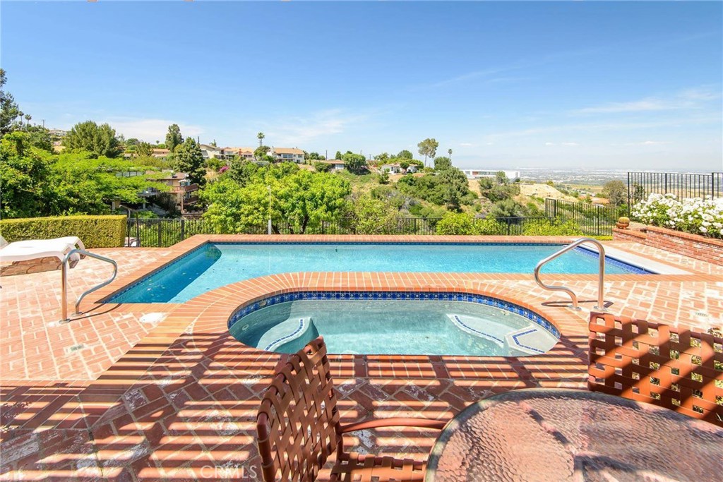 2721 Coral Ridge Road Rancho Palos Verdes, CA 90275 - Photo 22 of 24 a view of a swimming pool with an outdoor seating