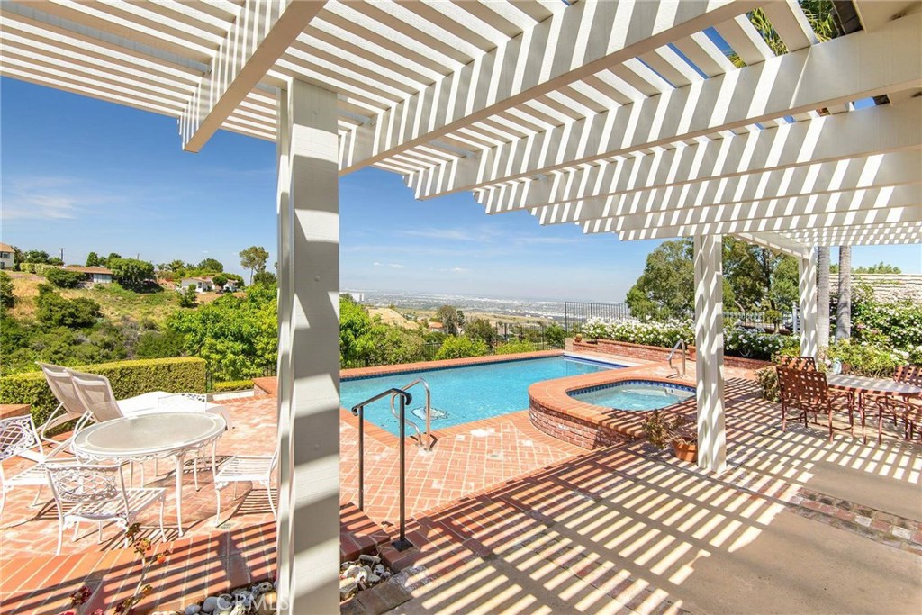 2721 Coral Ridge Road Rancho Palos Verdes, CA 90275 - Photo 23 of 24 a view of a balcony with chair and table