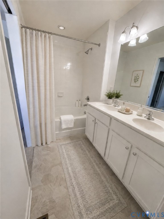 1944 Kennington Park Road Aylett, VA 23009 - Photo 10 of 24 Bathroom featuring a dual vanity with white cabine