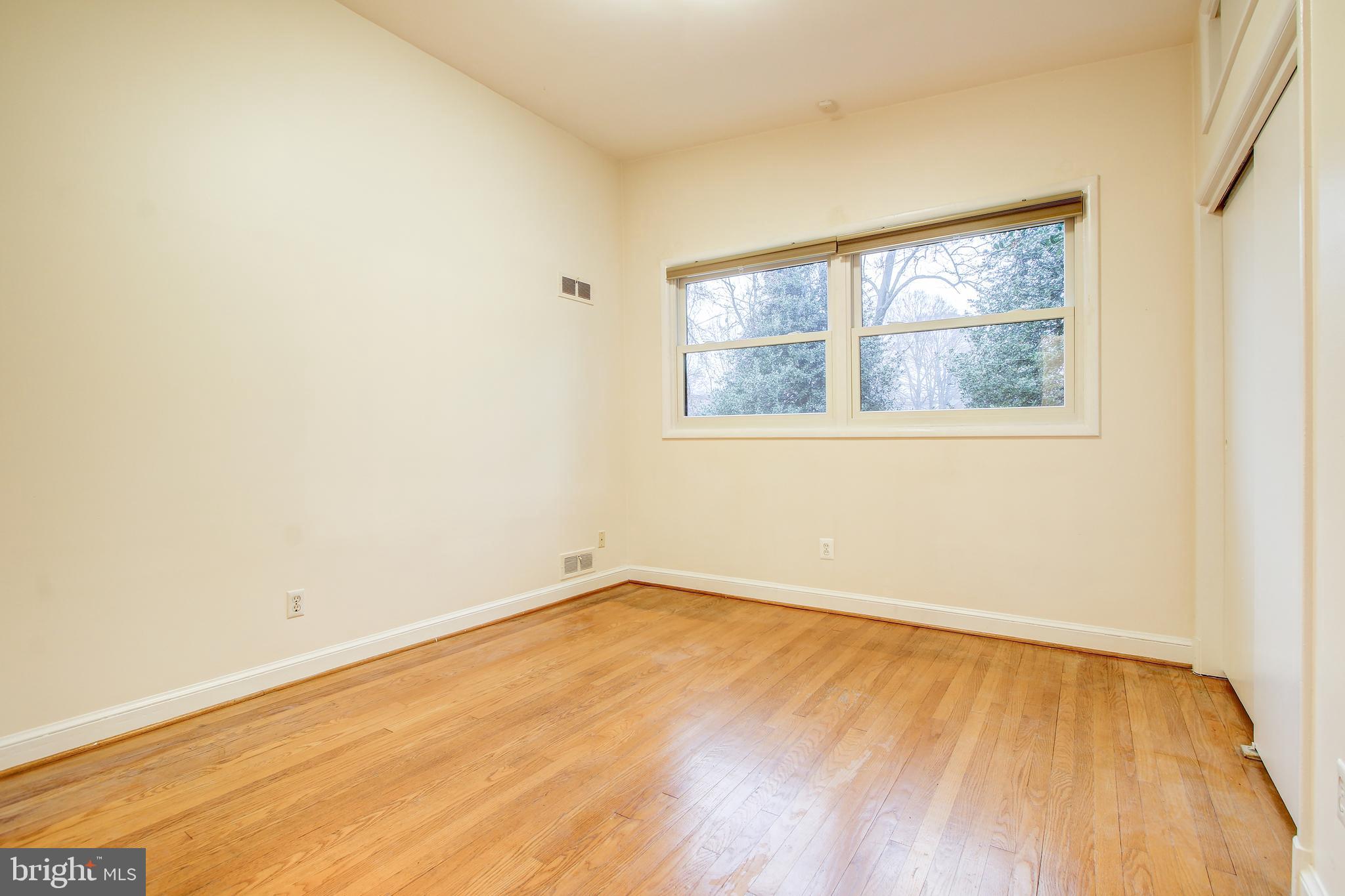 6006 28th Street Northwest Washington, DC 20015 - Photo 18 of 30 an empty room with a window