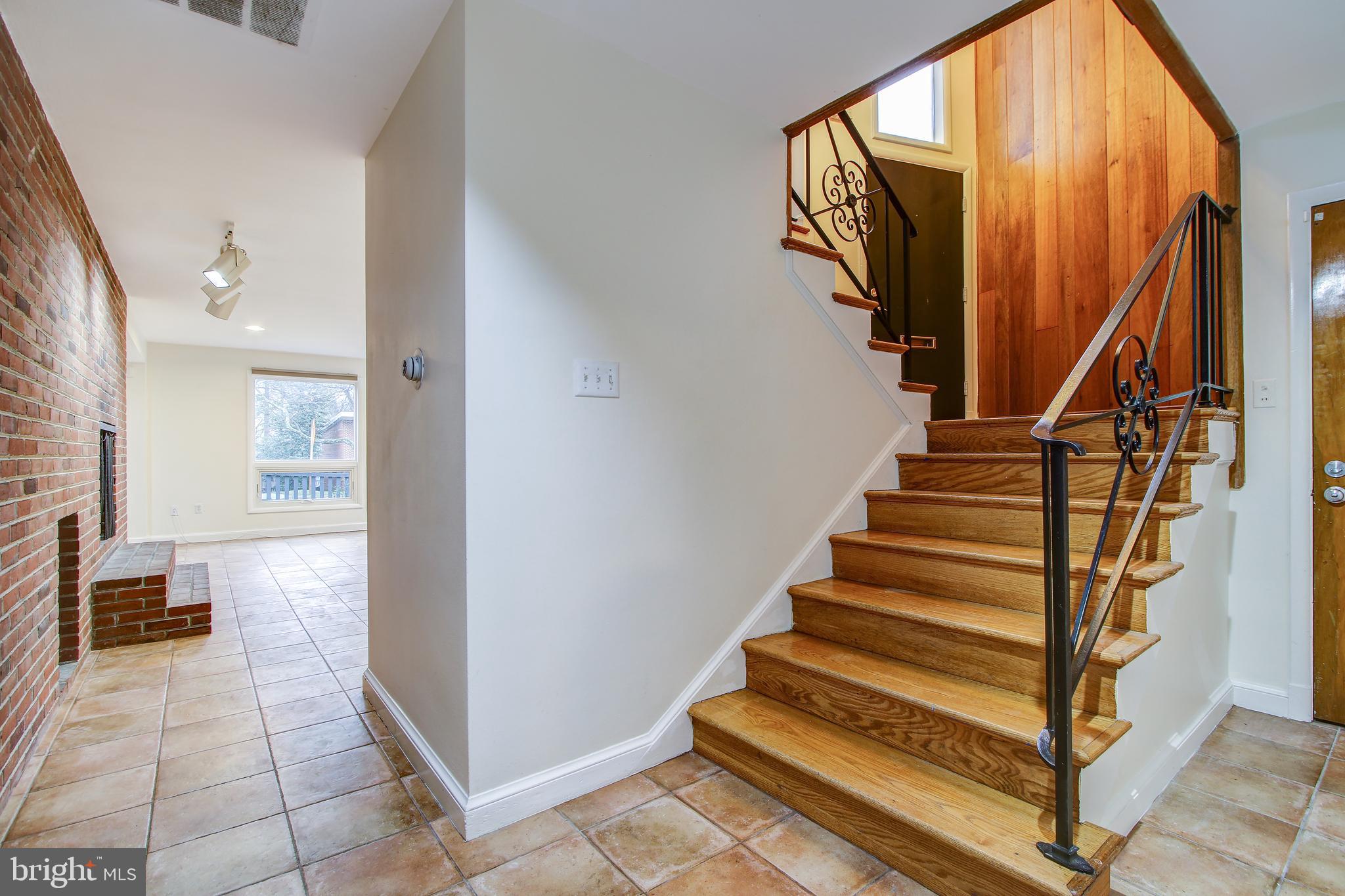 6006 28th Street Northwest Washington, DC 20015 - Photo 21 of 30 a view of entryway and hall with wooden floor