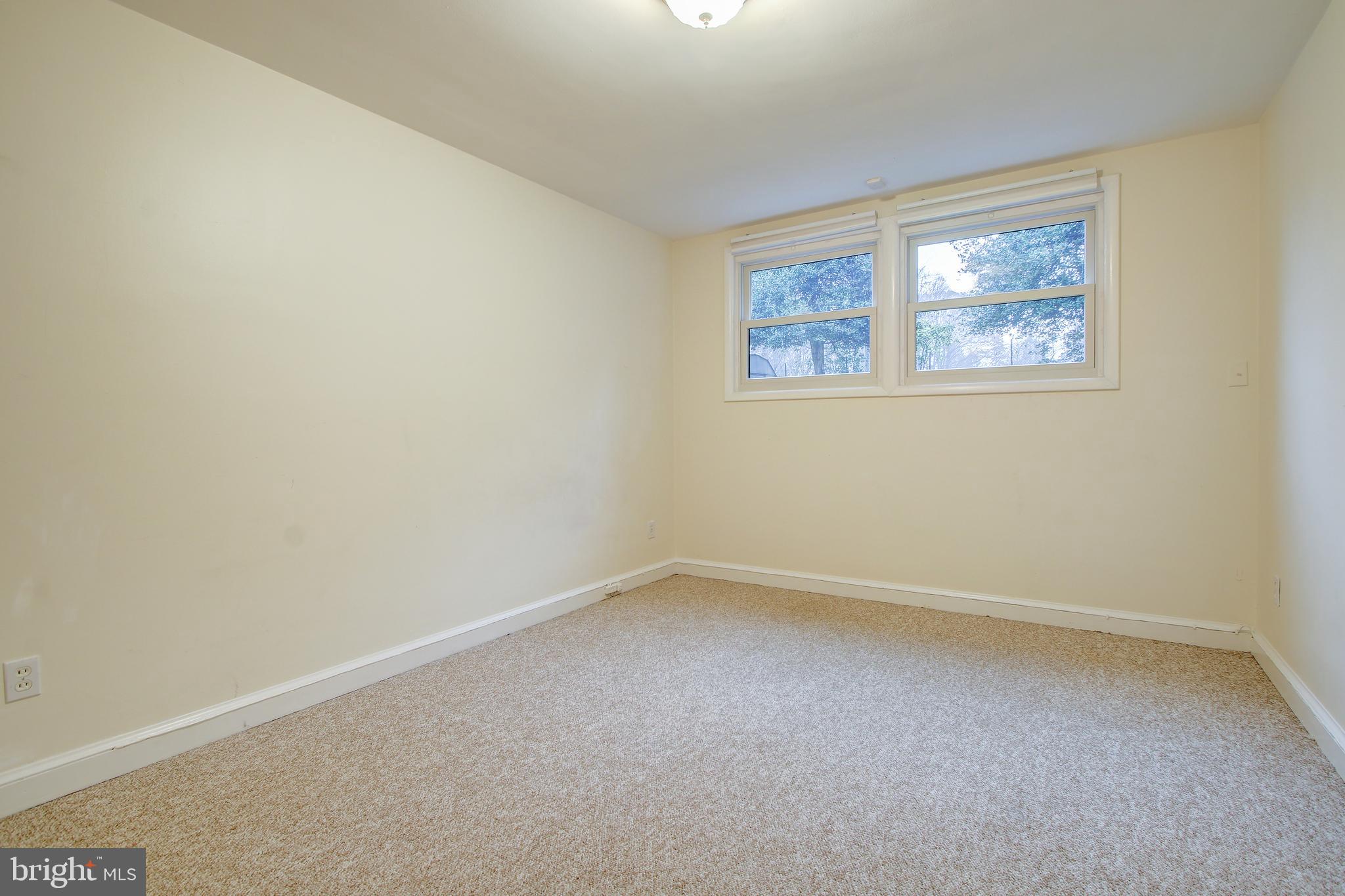 6006 28th Street Northwest Washington, DC 20015 - Photo 22 of 30 an empty room with a window