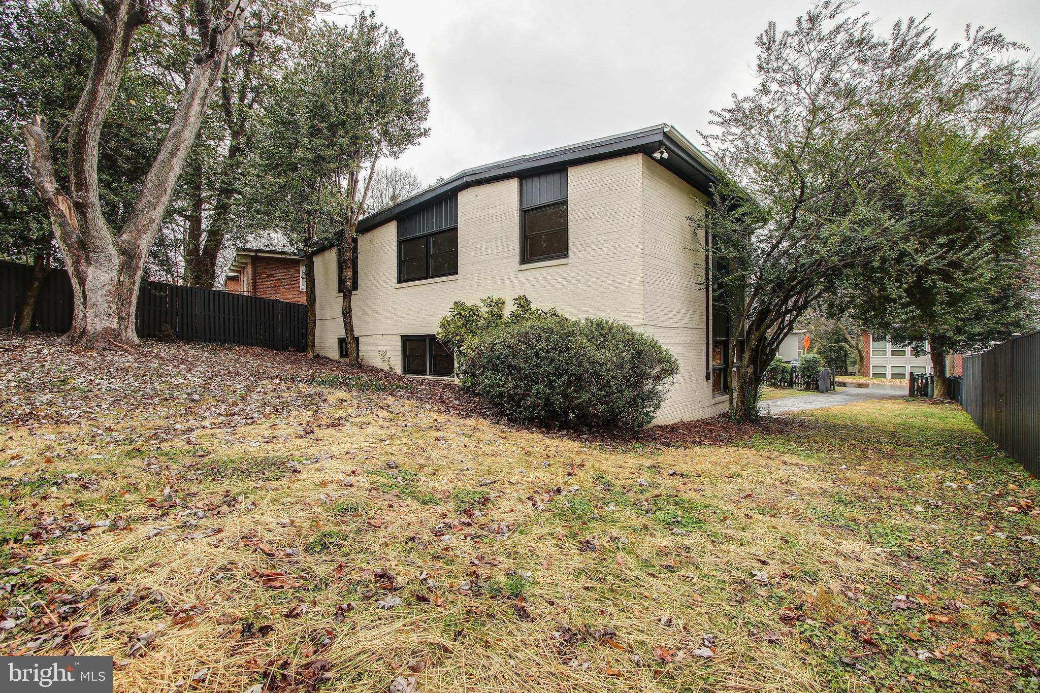 6006 28th Street Northwest Washington, DC 20015 - Photo 29 of 30 a house that has a tree in front of it