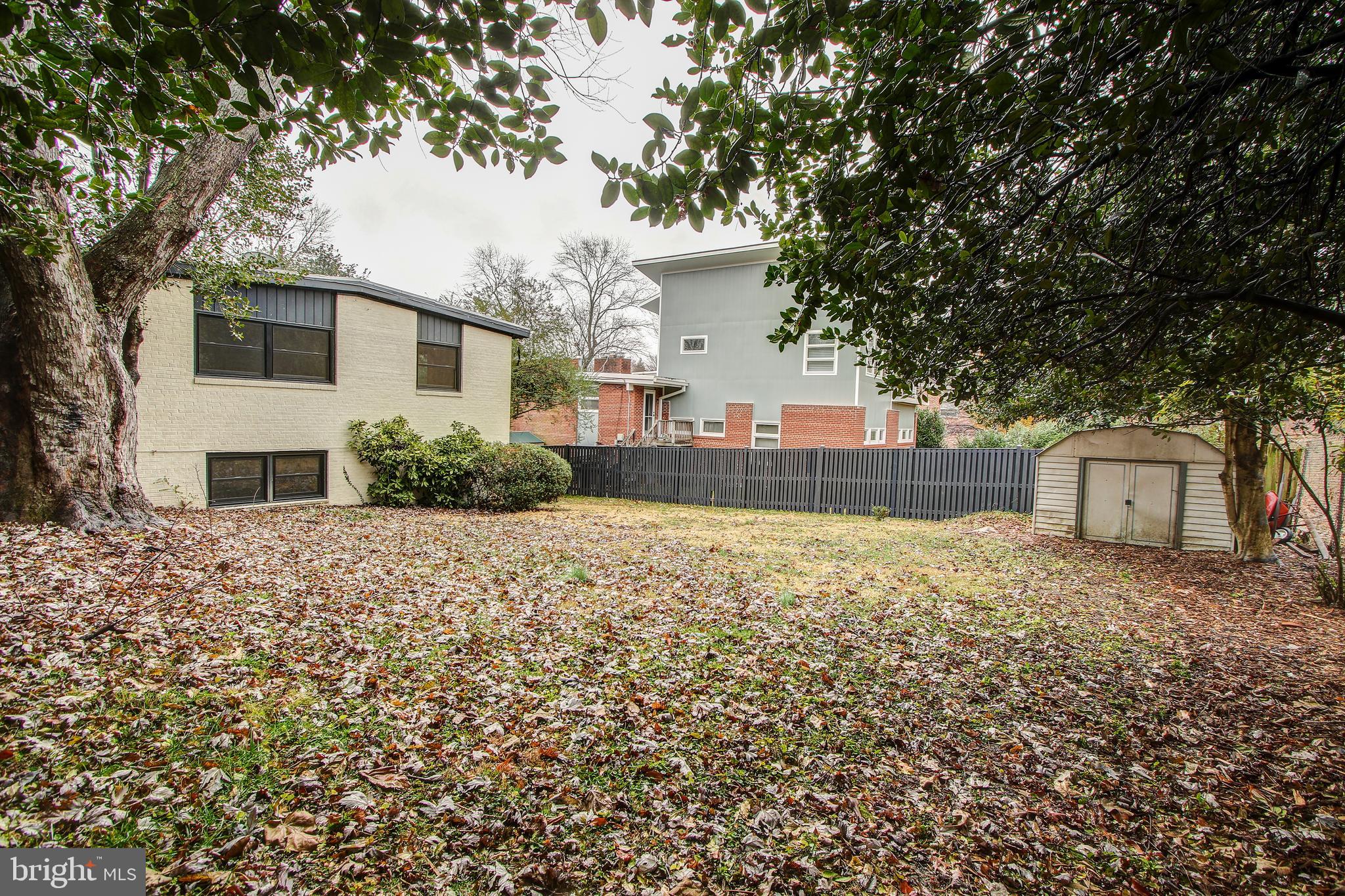 6006 28th Street Northwest Washington, DC 20015 - Photo 30 of 30 a front view of a house with a yard