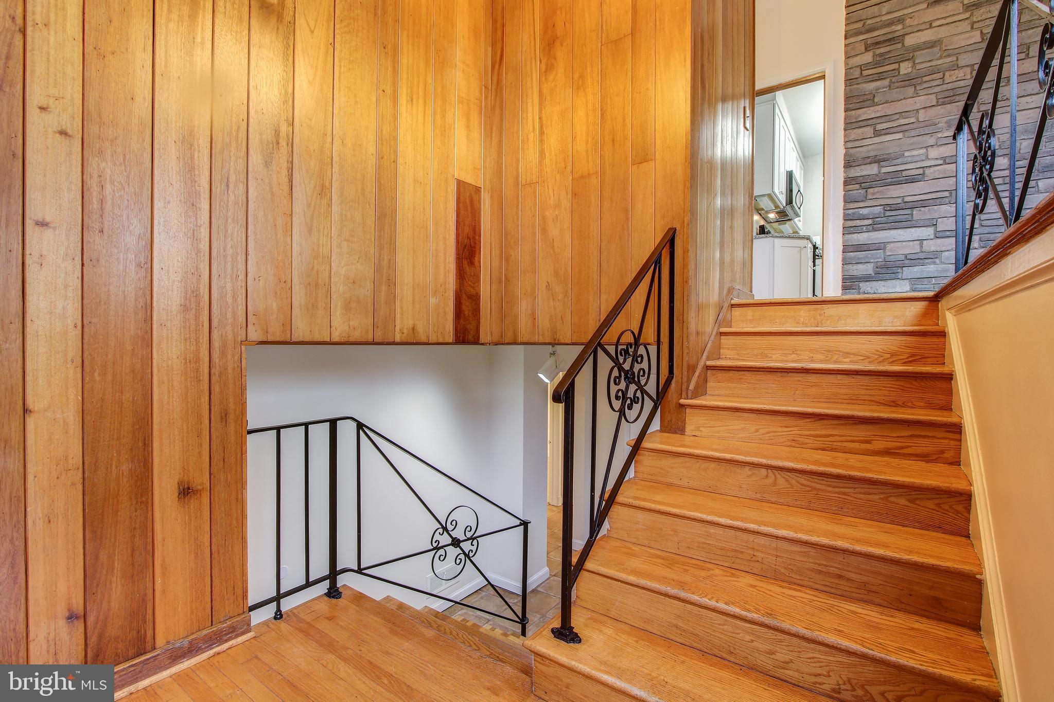 6006 28th Street Northwest Washington, DC 20015 - Photo 4 of 30 a view of staircase with railing and a window