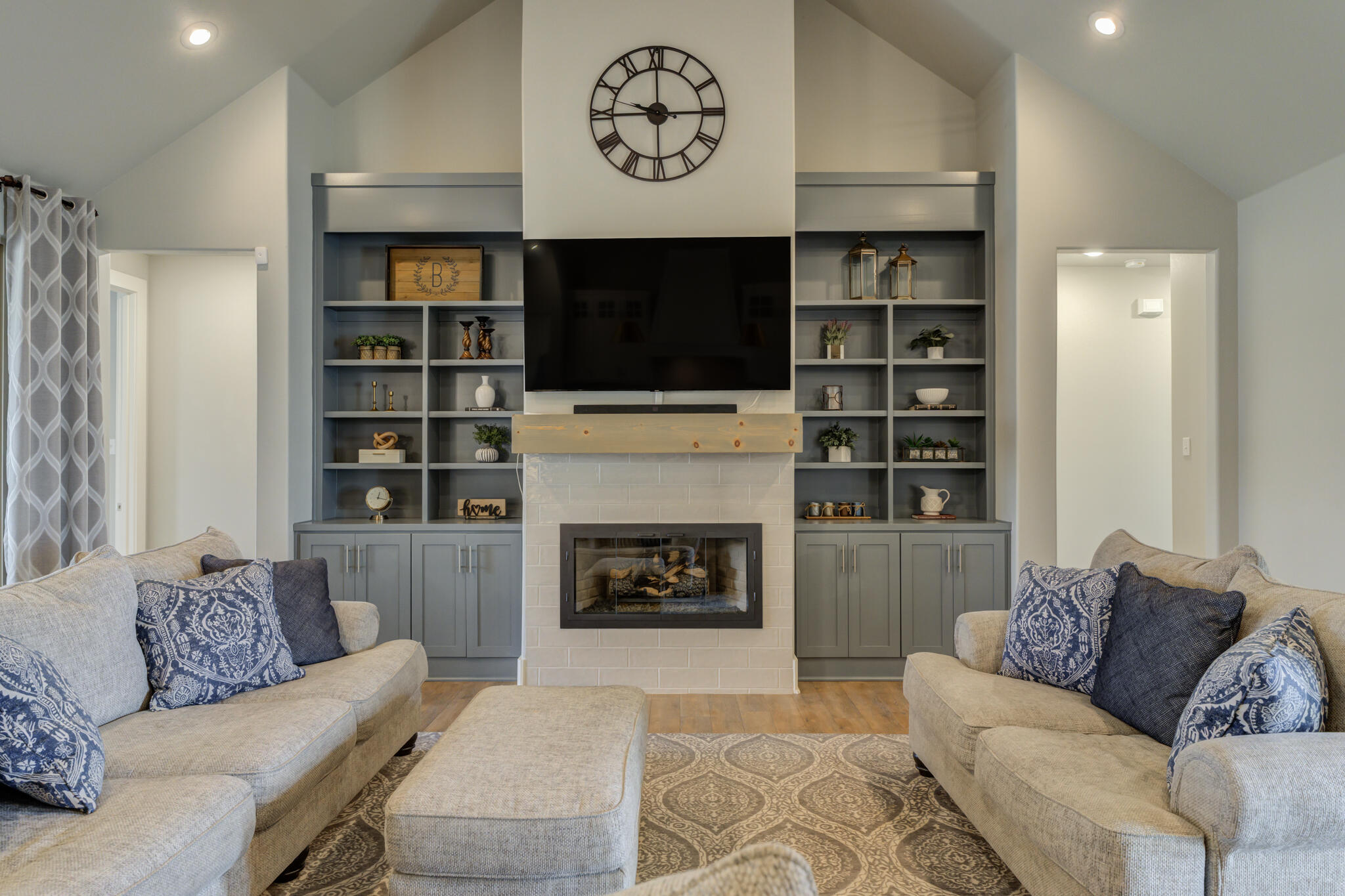 3918 137th Street Lubbock, TX 79423 - Photo 23 of 64 a living room with furniture and a fireplace