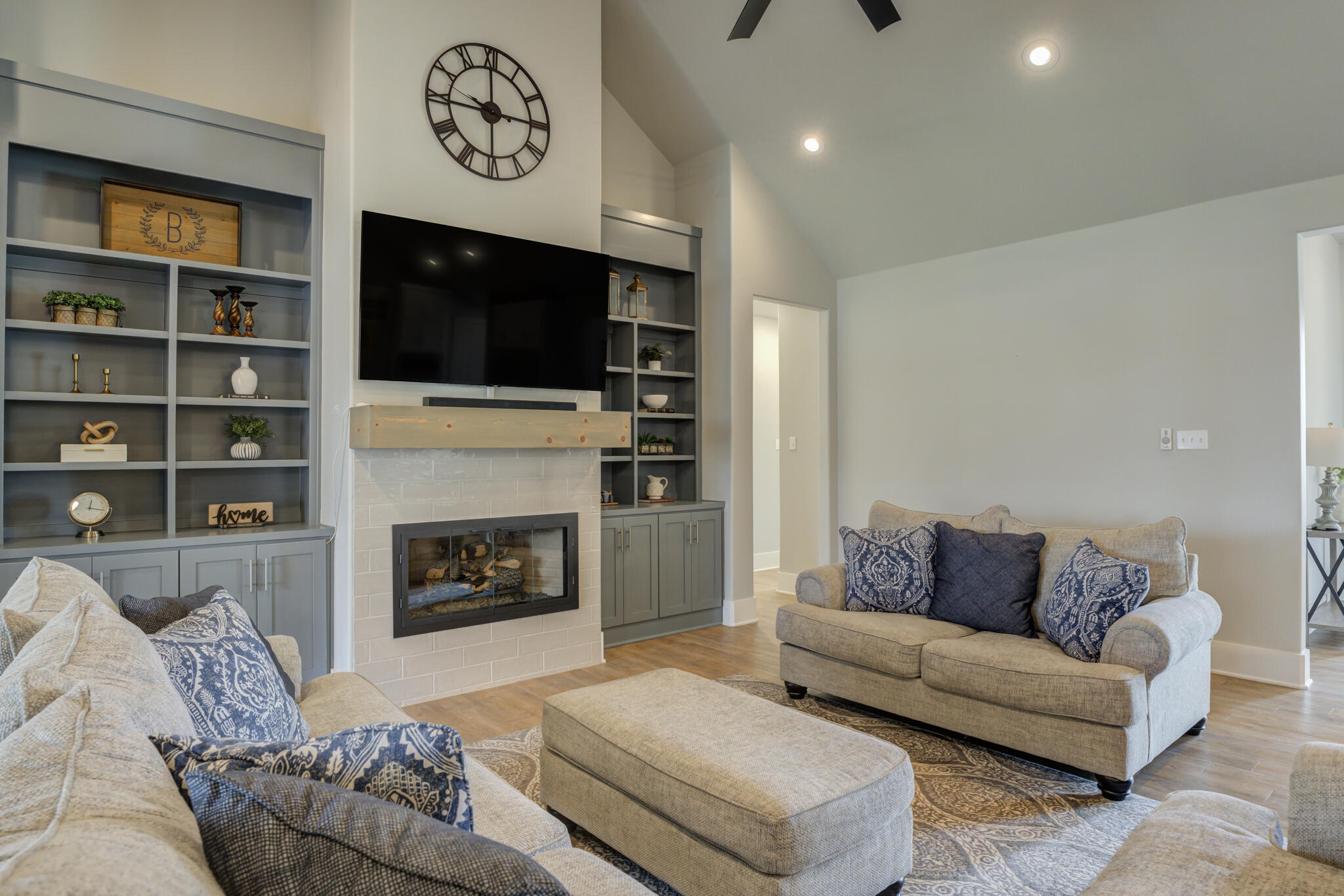 3918 137th Street Lubbock, TX 79423 - Photo 24 of 64 a living room with furniture and a fireplace