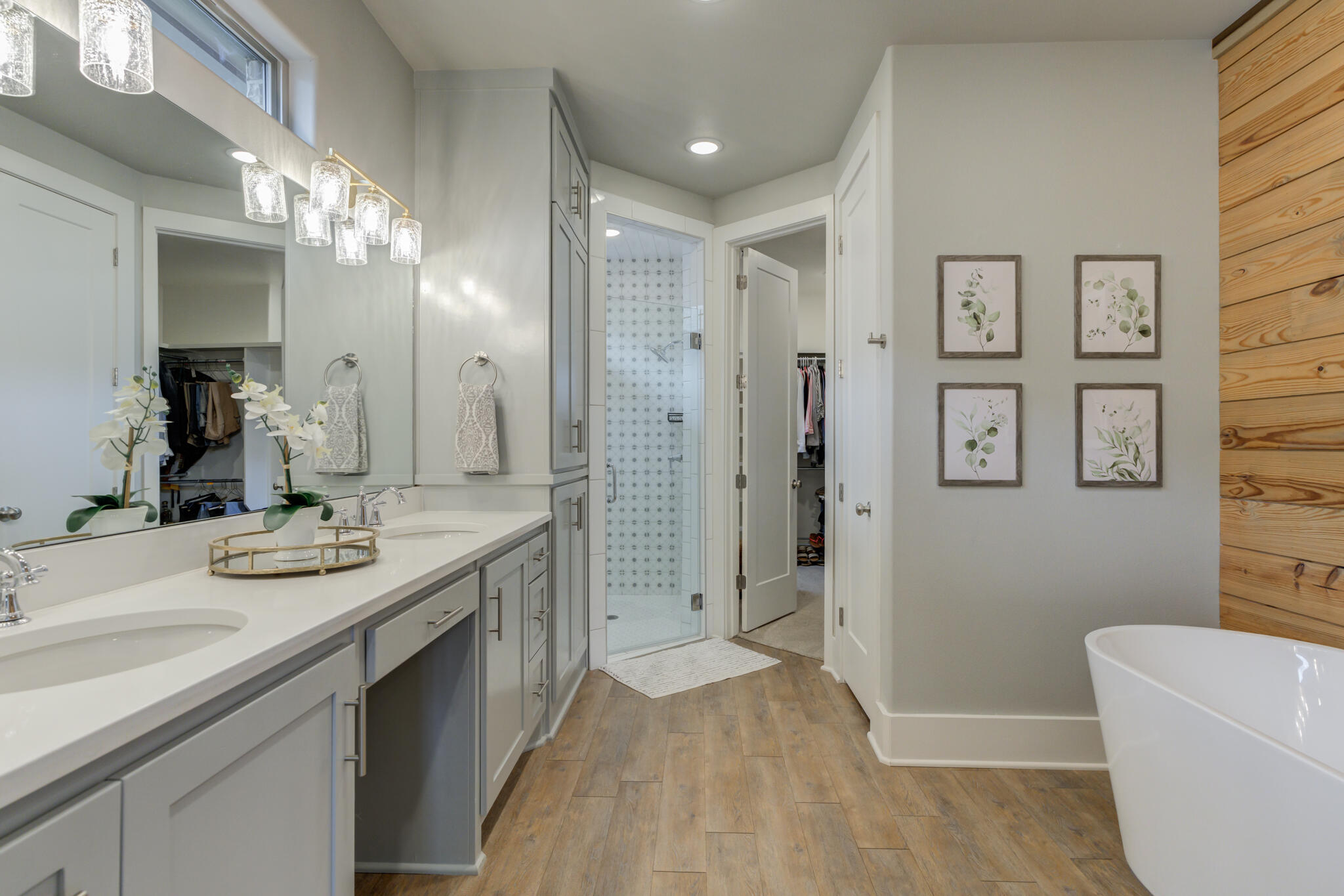 3918 137th Street Lubbock, TX 79423 - Photo 44 of 64 a spacious bathroom with a granite countertop sink a toilet a shower and a mirror