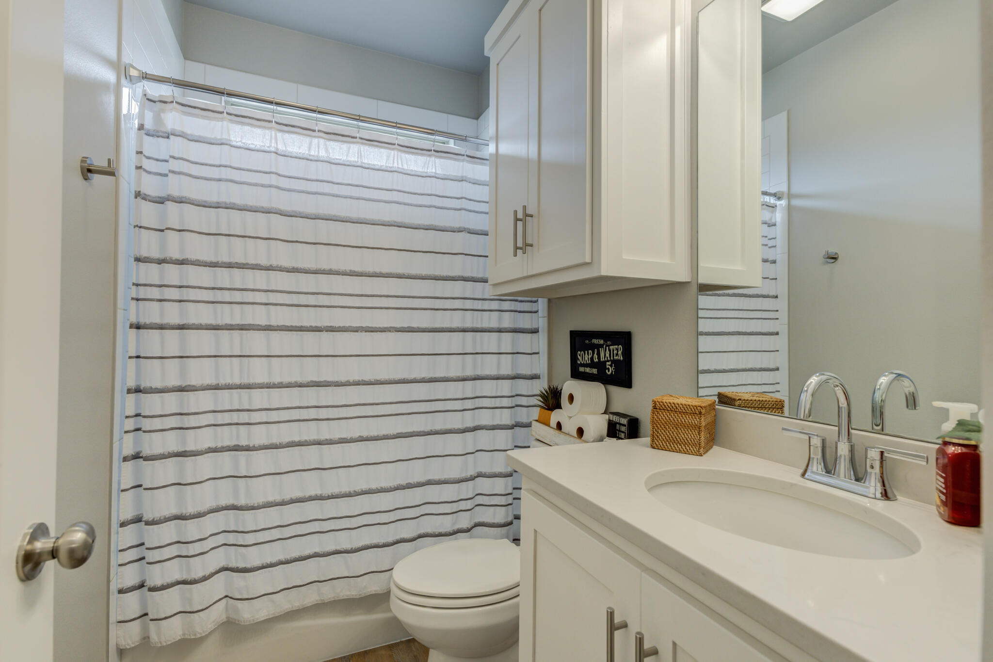 3918 137th Street Lubbock, TX 79423 - Photo 51 of 64 a bathroom with a sink a toilet and shower