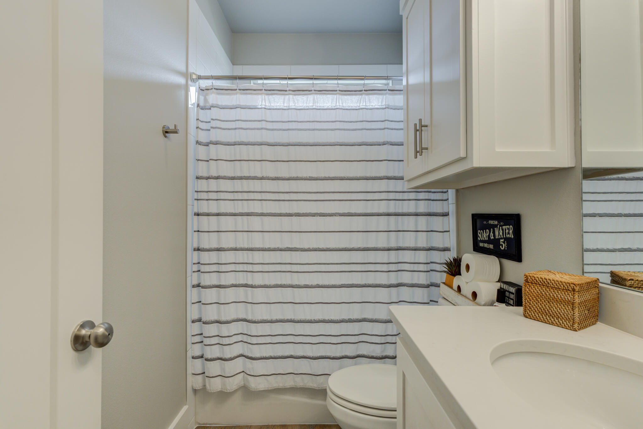 3918 137th Street Lubbock, TX 79423 - Photo 52 of 64 a bathroom with a sink a toilet and shower
