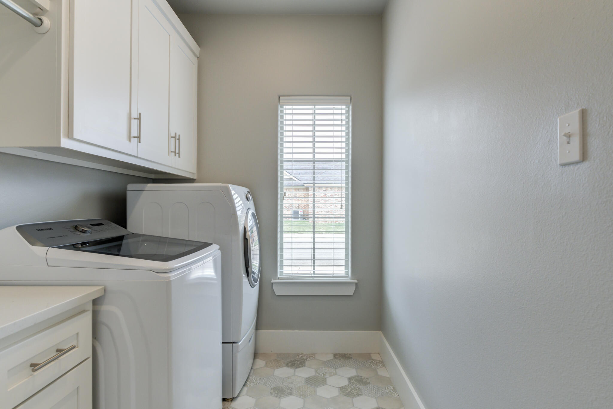 3918 137th Street Lubbock, TX 79423 - Photo 54 of 64 a utility room with dryer and washer