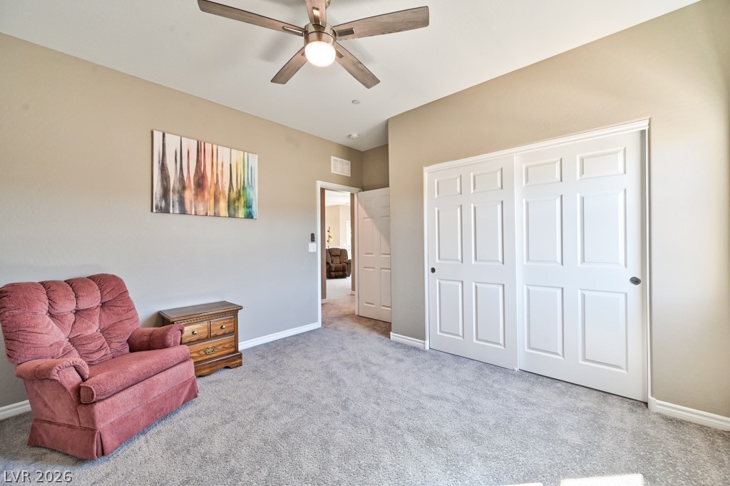 1054 Langston Ranch Avenue Henderson, NV 89002 - Photo 46 of 82 Bedroom 3 light carpet and a ceiling fan