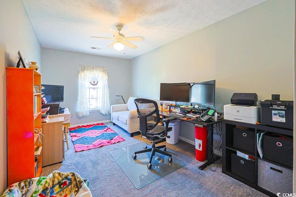 2033 Chadbury Lane Myrtle Beach, SC 29588 - Photo 25 of 39 Office space featuring carpet, ceiling fan, and a textured ceiling