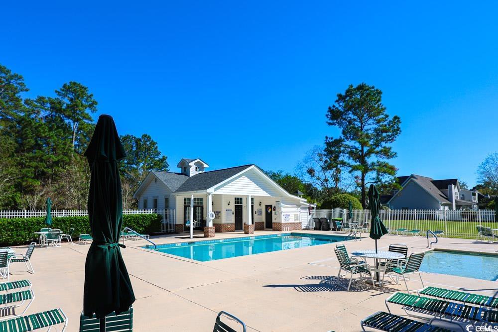 2033 Chadbury Lane Myrtle Beach, SC 29588 - Photo 34 of 39 Community pool featuring a patio