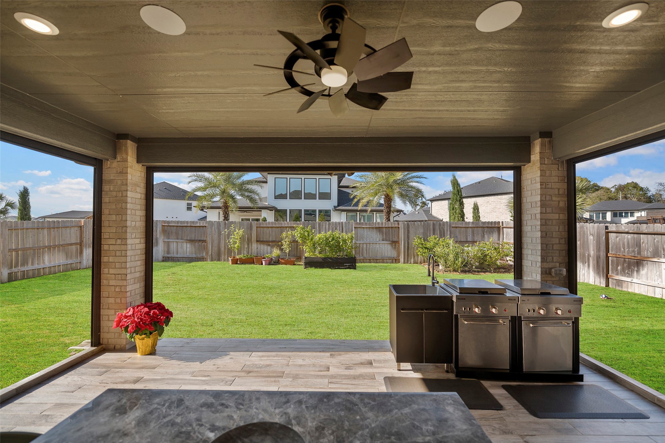 4802 Pecos Ridge Lane Sugar Land, TX 77479 - Photo 14 of 32 a view of a porch with furniture and garden