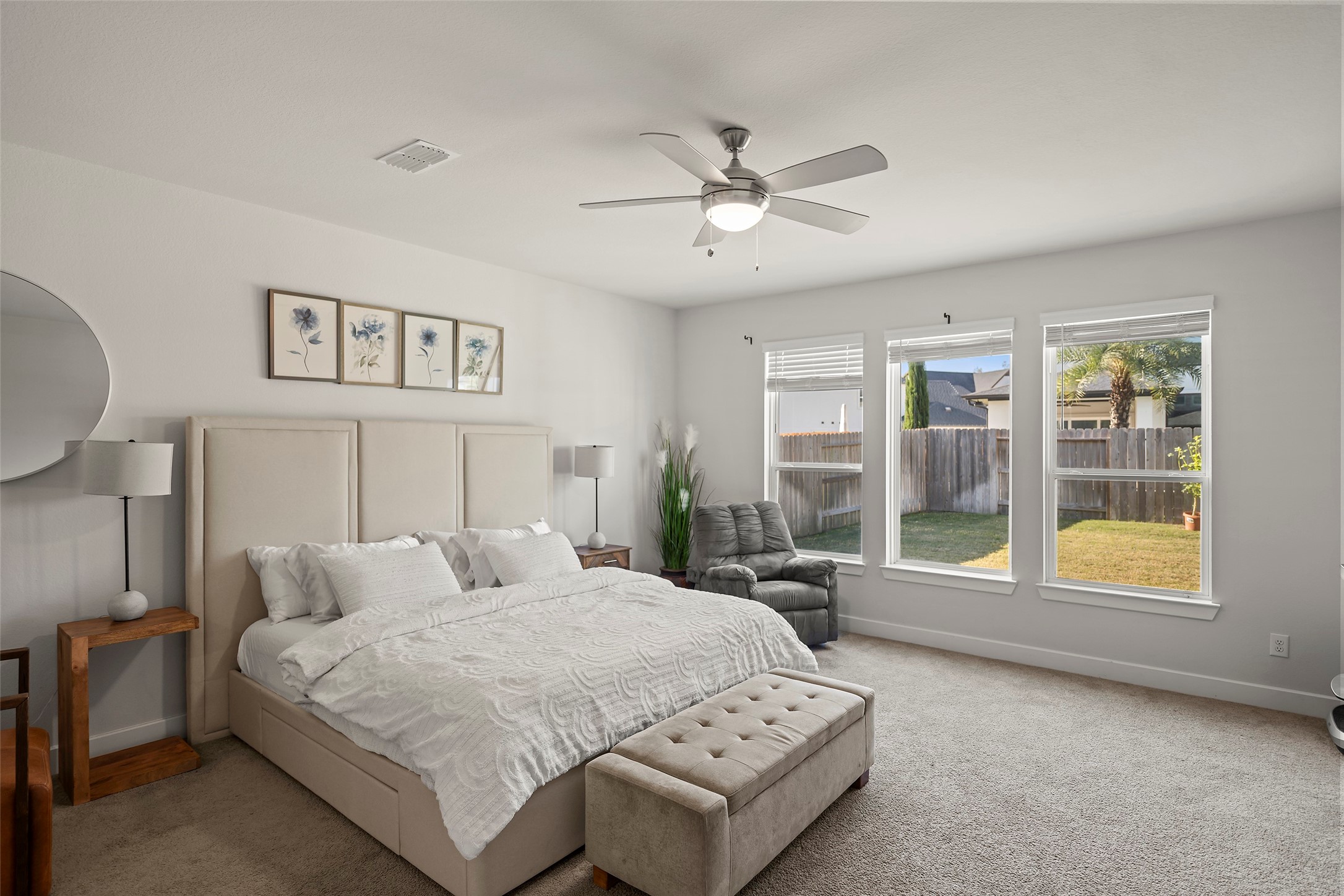 4802 Pecos Ridge Lane Sugar Land, TX 77479 - Photo 16 of 32 a bedroom with a bed and a large window