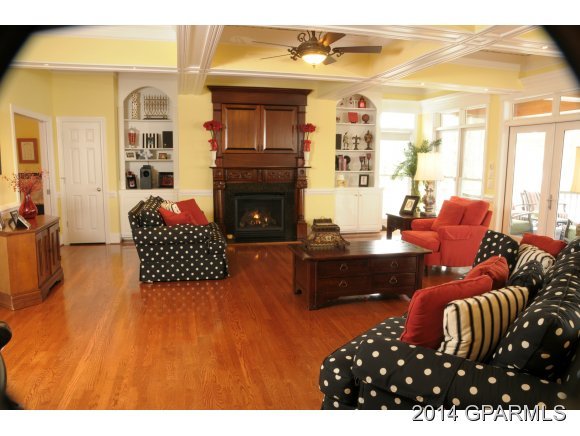 570 Jamaka Road Washington, NC 27889 - Photo 12 of 36 Family Room-Unique window trim and Ernest Hemingway Style Fans. Mahogany and Granite Fireplace
