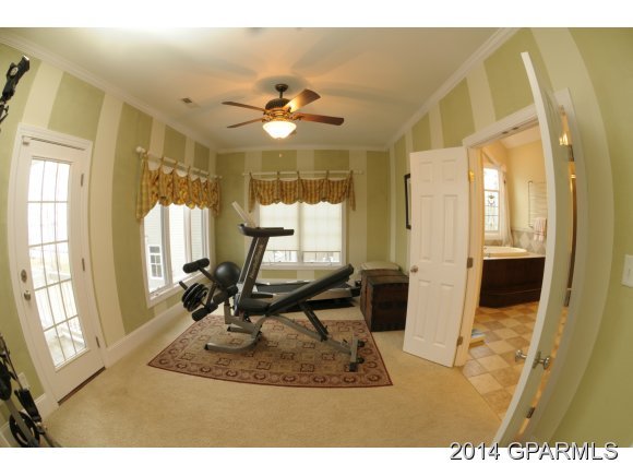 570 Jamaka Road Washington, NC 27889 - Photo 25 of 36 Sitting Room off Master with Pocket doors which make it ideal for a home gym that overlooks the water. Doors lead to upstairs Porch