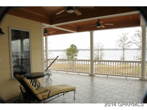 570 Jamaka Road Washington, NC 27889 - Photo 26 of 36 Upstairs Porch-Porch is off Master Room Exercise Area-tiled Floors and Hardwood Ceilings.