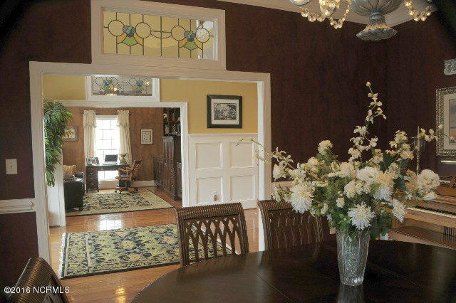 570 Jamaka Road Washington, NC 27889 - Photo 5 of 36 Formal Dining Room-Antique Stained Glass throughout the downstairs.