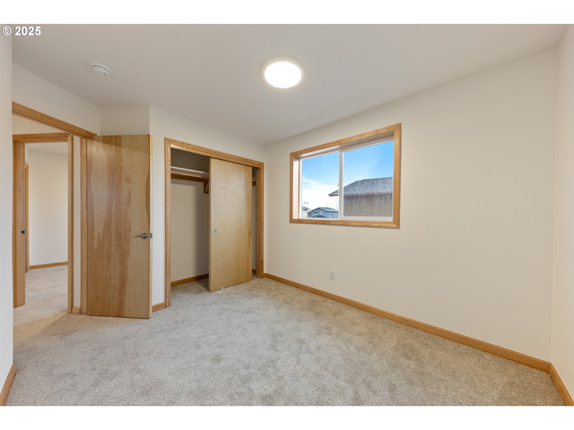 658 ST Charles Street Eugene, OR 97402 - Photo 19 of 29 a view of an empty room with closet and a window