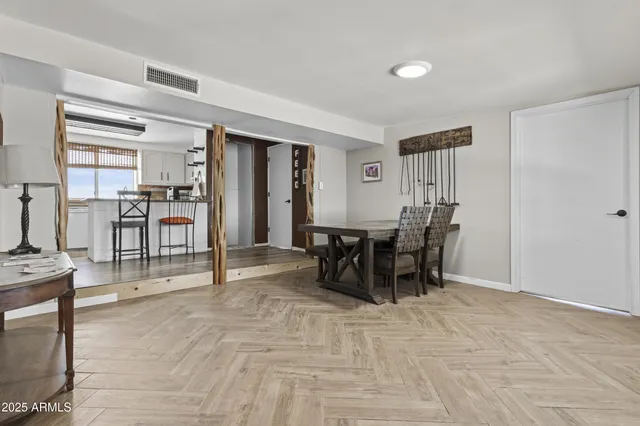 a living room with furniture and a couch